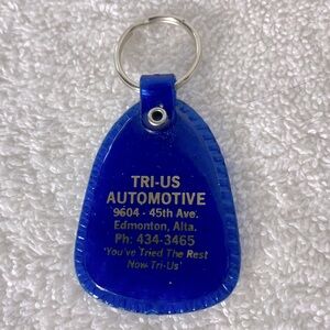 5/$35 Vintage Tri-Us Automotive Blue Keychain W Gold Text